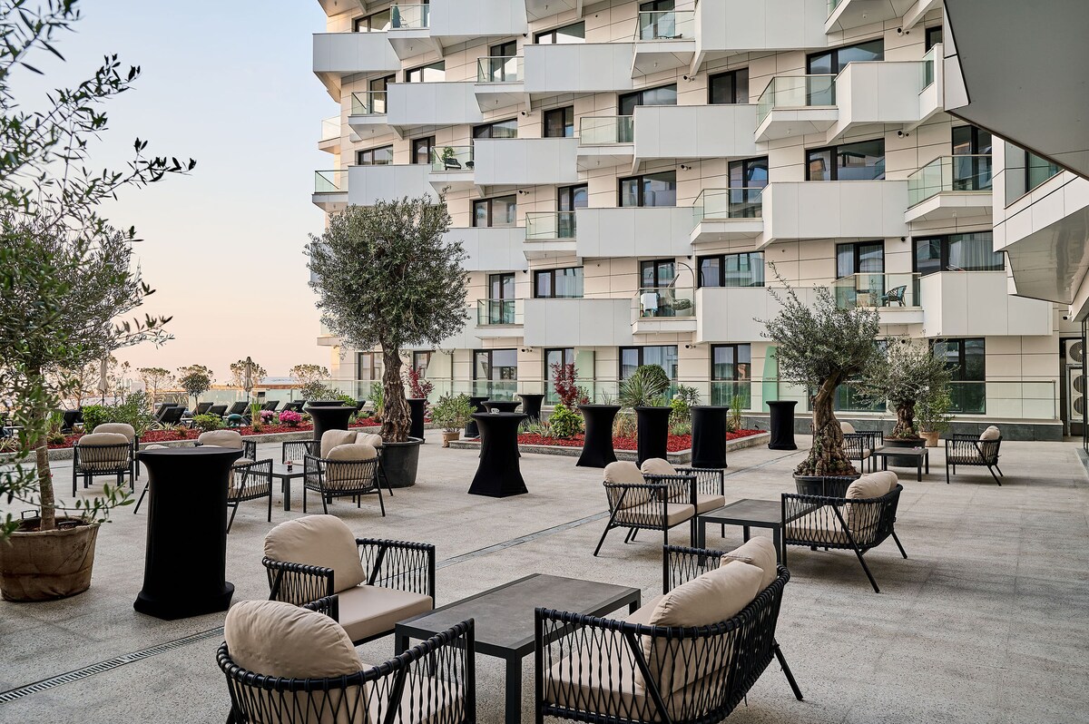 Wave n’ Sea Apartment in Infinity Beach Resort - parking — Apartment — sea-view vacation rental at Infinity Resort & SPA, Mamaia Nord, Constanța, Romania — property photo 2 | Aqua Vista Rentals