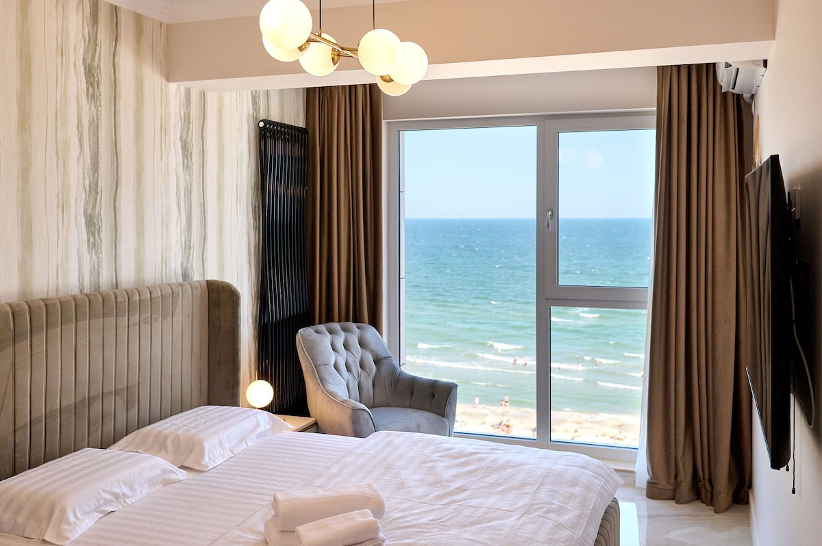 Beach Bliss Apartment in Infinity Beach Resort parking — Apartament — închiriere de vacanță în Infinity Resort & SPA, Mamaia Nord, Constanța, România — fotografia principală a proprietății | Aqua Vista Rentals