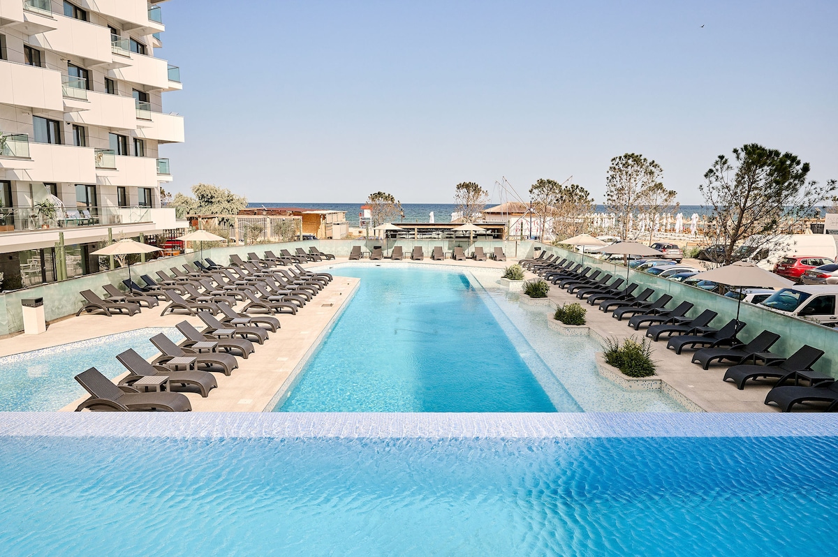 Smarald Sea View Apartment in Infinity Beach Resort - parking — Apartament — închiriere de vacanță cu vedere la mare în Infinity Resort & SPA, Mamaia Nord, Constanța, România — fotografia 8 a proprietății | Aqua Vista Rentals