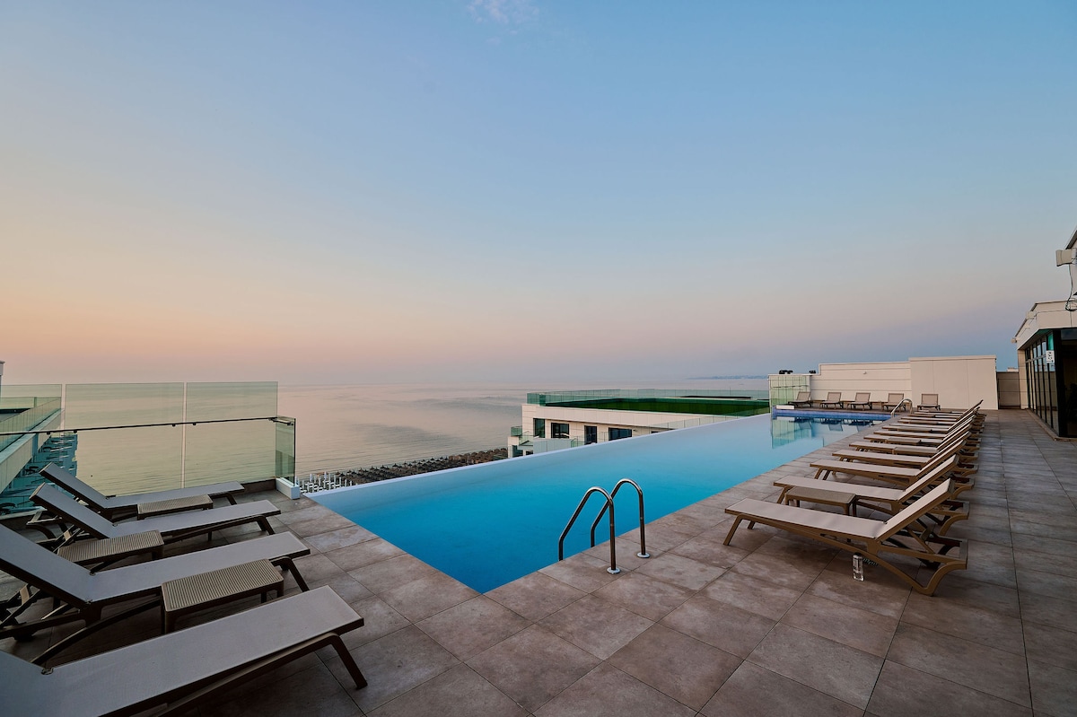 NewVision Apartment in Infinity Beach Resort - parking — Apartament — închiriere de vacanță în Infinity Resort & SPA, Mamaia Nord, Constanța, România — fotografia 7 a proprietății | Aqua Vista Rentals