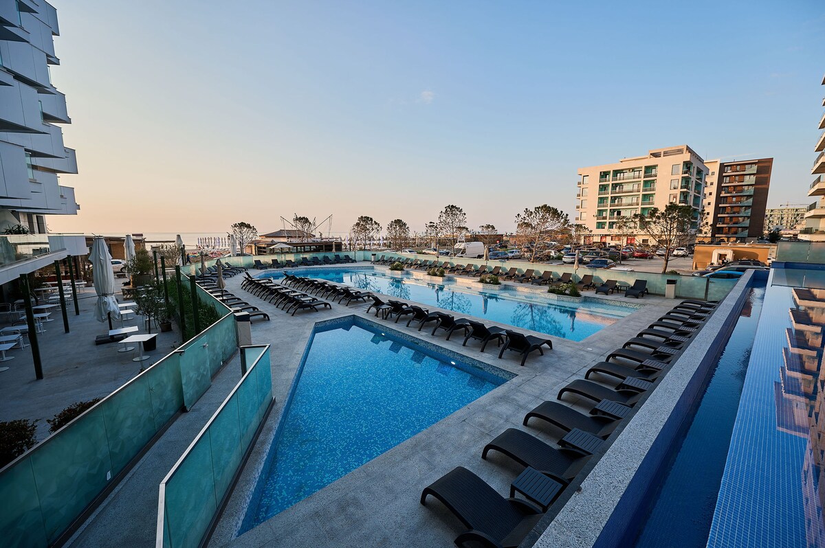 Beach Side Heaven Apartment in Infinity Beach Resort - parking — Apartment — sea-view vacation rental at Infinity Resort & SPA, Mamaia Nord, Constanța, Romania — property photo 2 | Aqua Vista Rentals