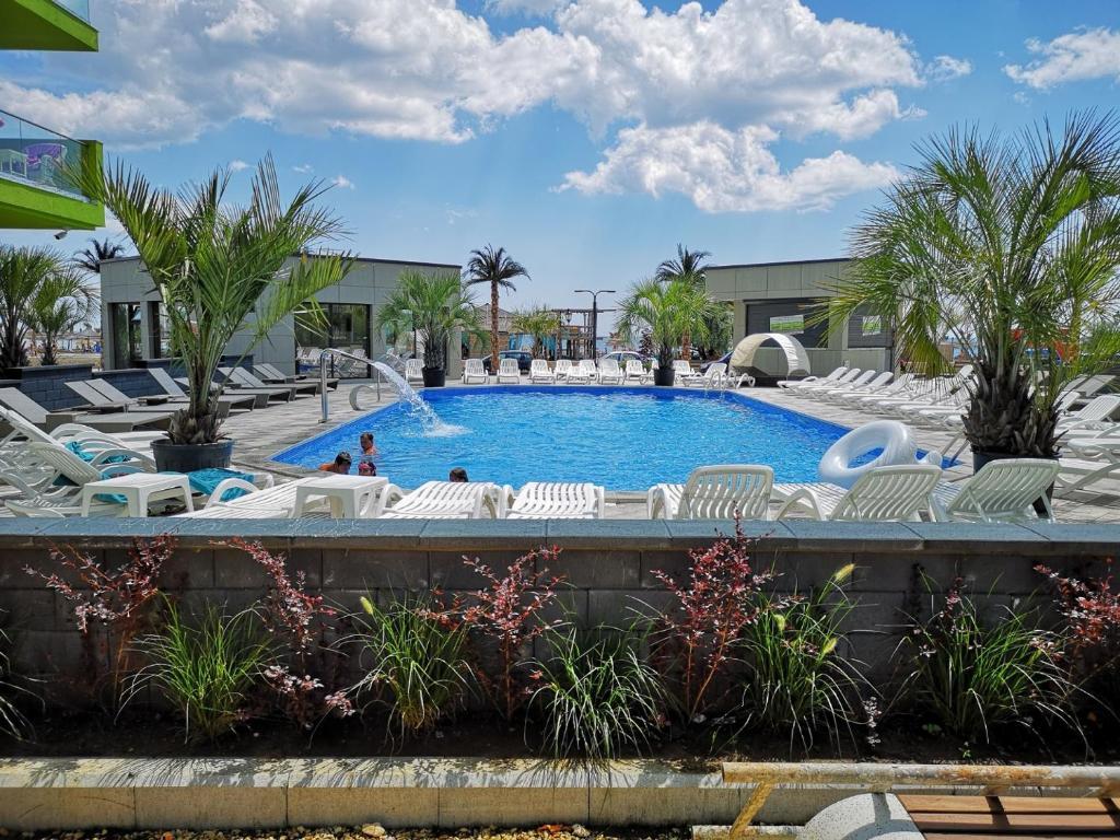Red Apartament in Spa n Pool Beach resort — Apartament — închiriere de vacanță cu vedere la mare în Alezzi Beach Resort, Mamaia Nord, Constanța, România — fotografia 6 a proprietății | Aqua Vista Rentals