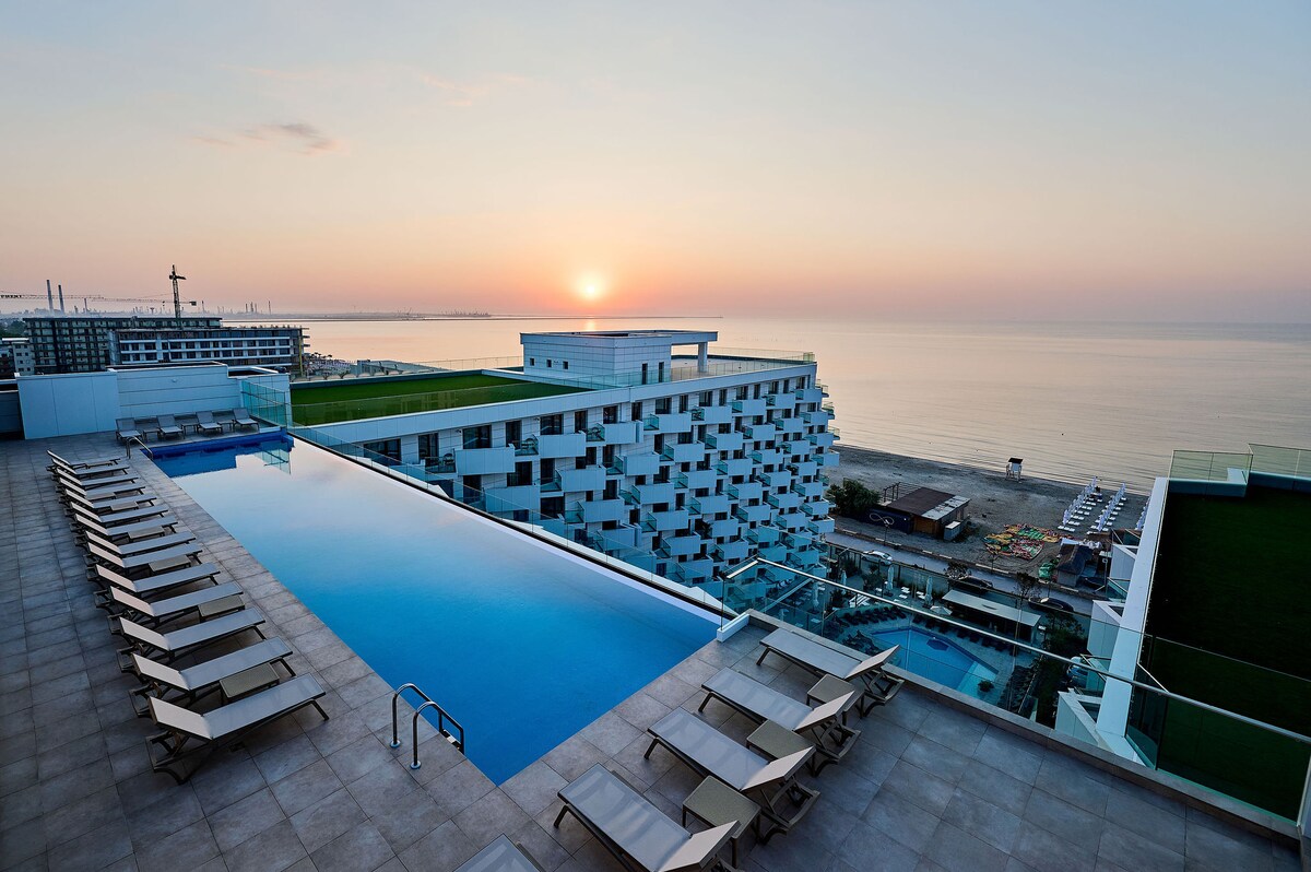 Sun & Fun Apartment Infinity Pool Spa Resort — Apartment — vacation rental at Infinity Resort & SPA, Mamaia Nord, Constanța, Romania — main property photo | Aqua Vista Rentals