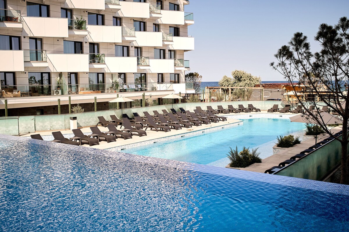 Laguna Breeze Apartment in Infinity Spa & Pool — Apartment — vacation rental at Infinity Resort & SPA, Mamaia Nord, Constanța, Romania — property photo 4 | Aqua Vista Rentals